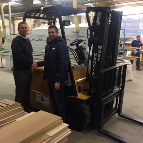 MCM Director shakes on forklift deal